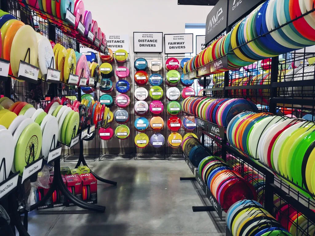 Racks of Disc golf discs inside disc golf store