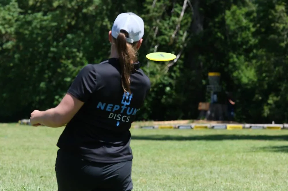 Natalie Ryans sponsored by Neptune Discs makes an approach shot to the island.