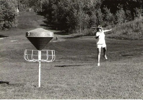 An image of a disc golfer in the 70's