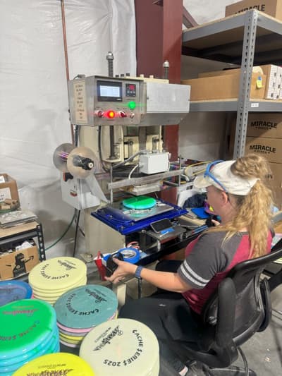 An Infinite Discs stamp machine