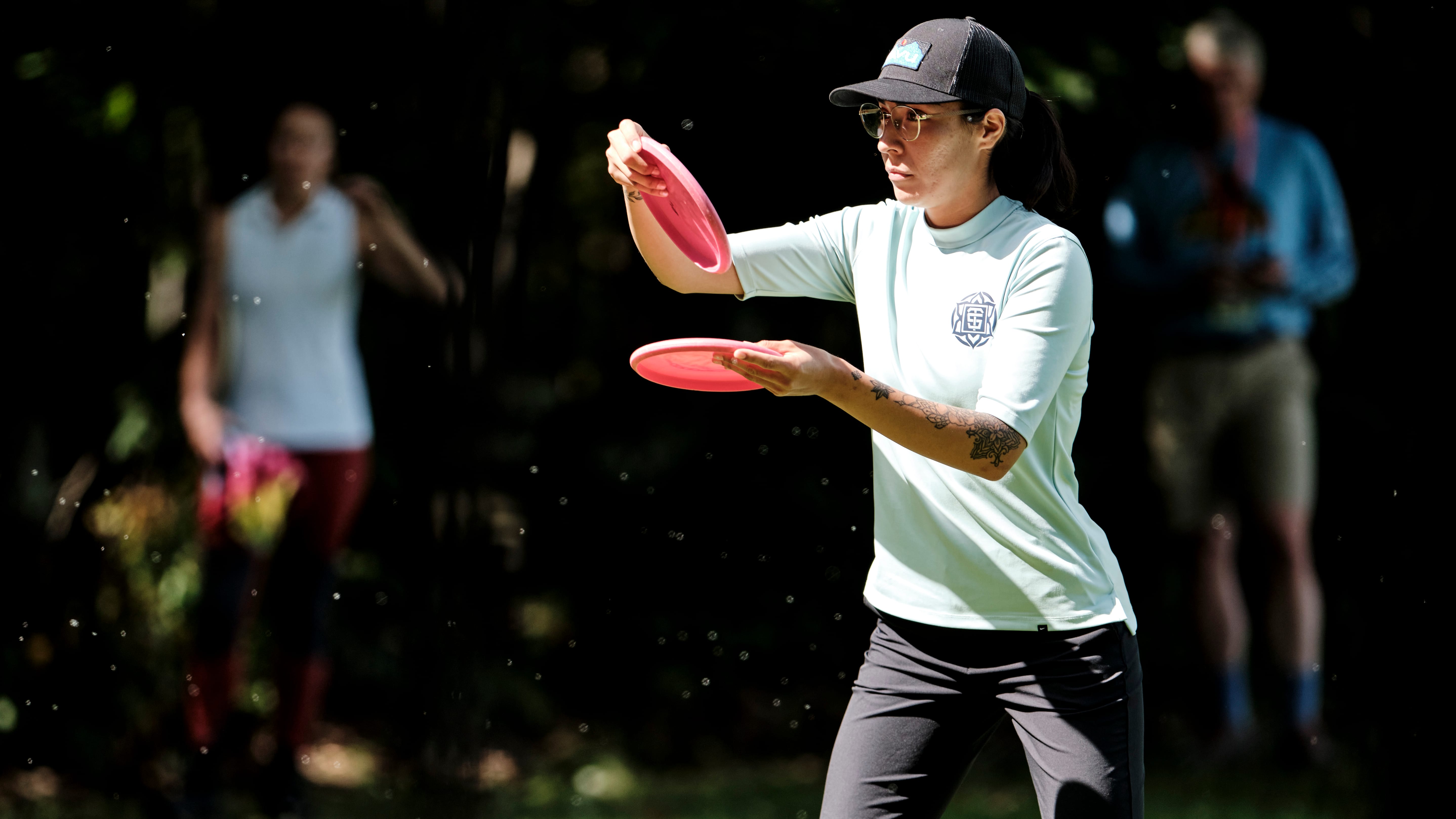 Disc Golfer putting