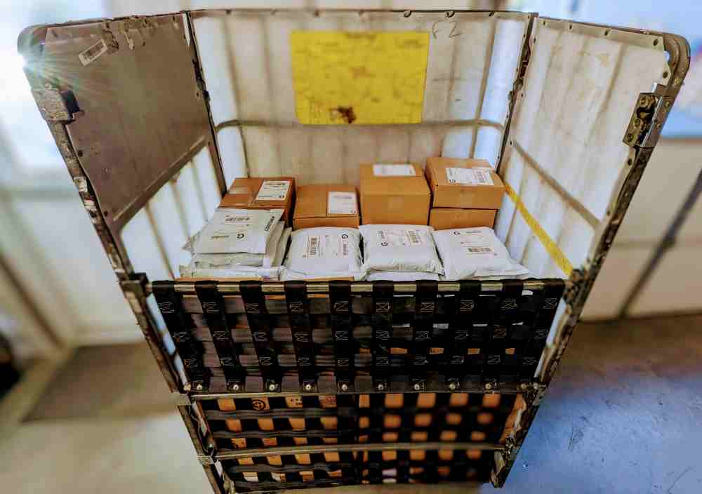 Stacks of Disc Golf Packages waiting to ship